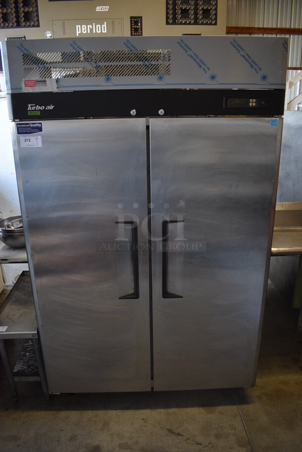 Turbo Air Model M3F47-2-N Stainless Steel Commercial 2 Door Reach In Freezer w/ Poly Coated Racks on Commercial Casters. 115 Volts, 1 Phase. 12x30x25. Tested and Working!