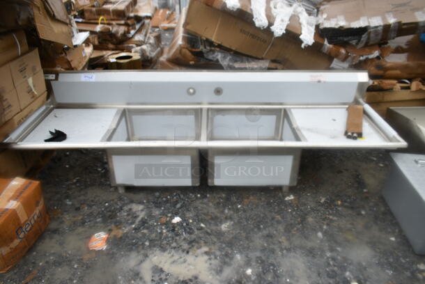 BRAND NEW SCRATCH AND DENT! Regency 600S22323224 96" 16 Gauge Stainless Steel Two Compartment Sink with Galvanized Steel Legs and 2 Drainboards - 23" x 23" x 12" Bowls. No Legs.  - Image 2 of 9