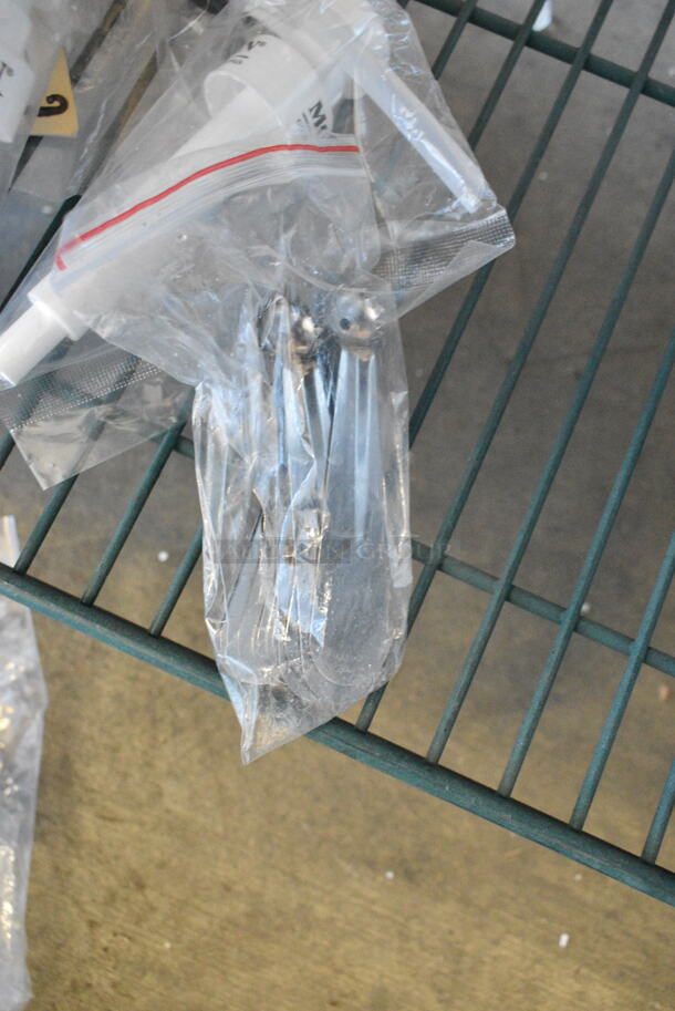 5 BRAND NEW SCRATCH AND DENT! Items Including Regency 600FGNZ610 6" Long Swivel Gooseneck Spout with 2 GPM Aerator, 407SKMRMAN11 Choice 11" Stainless Steel Wok Skimmer, 554TRNSD94 Backyard Pro 9" x 4" High Heat Solid Turner with Black Handle, 407TOMCSS12 Choice Tomato Corer with Stainless Steel Handle - 12/Pack, Monin Pumps. 5 Times Your Bid!  - Image 9 of 12