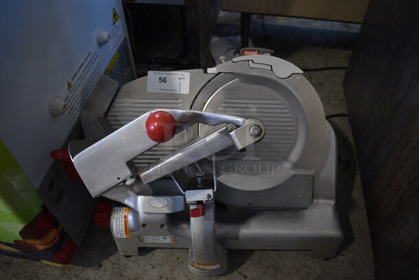 Berkel Model 909E Stainless Steel Commercial Countertop Meat Slicer w/ Blade Sharpener. 115 Volts, 1 Phase. 25x21x24. Tested and Working!