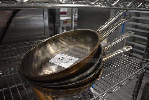 4 Metal Skillets. 18x10x2. 4 Times Your Bid!