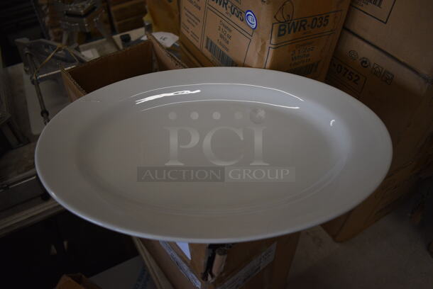6 BRAND NEW IN BOX! Oneida White Ceramic Oval Plates. 15x10.5x1. 6 Times Your Bid!