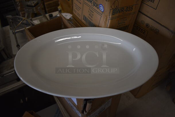 6 BRAND NEW IN BOX! Oneida White Ceramic Oval Plates. 15x10.5x1. 6 Times Your Bid! - Image 1 of 3