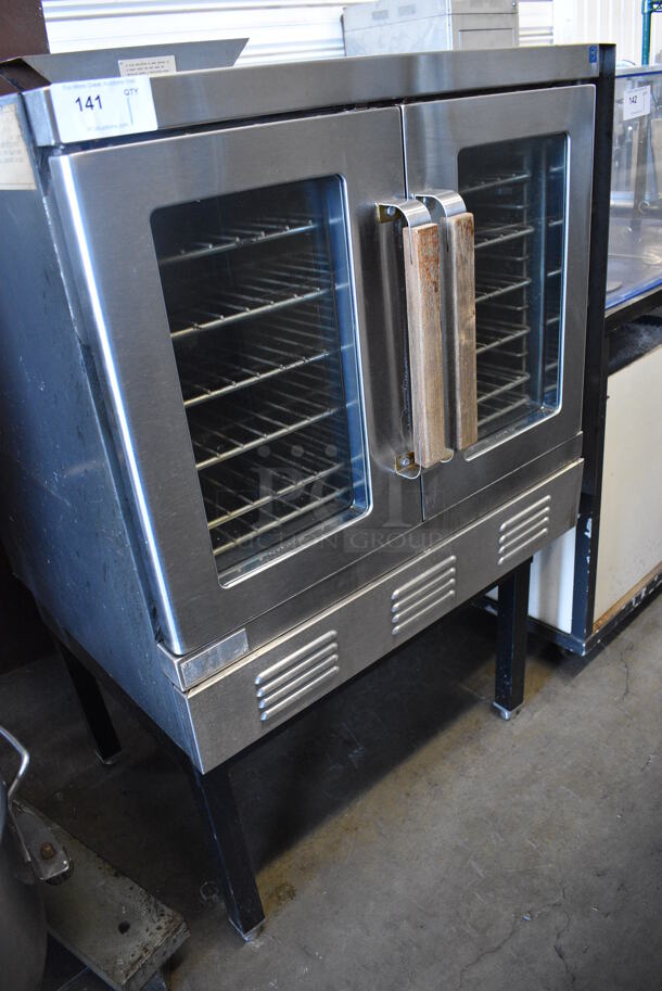 Vulcan Snorkel Stainless Steel Commercial Propane Gas Powered Full Size Convection Oven w/ View Through Doors, Metal Oven Racks and Thermostatic Controls on Metal Legs. 40x31x59