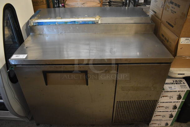 2011 True Model TPP-44 Stainless Steel Commercial Pizza Prep Table on Commercial Casters. 115 Volts, 1 Phase. 45x32x43. Cannot Test Due To Cut Power Cord