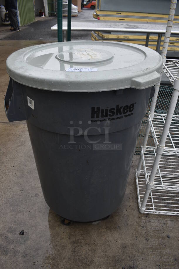 Rubbermaid Huskee Gray Poly Trash Can w/ Lid on Dolly. 26x24x36 - Image 1 of 4