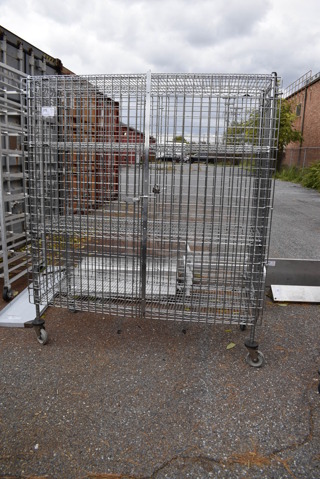 Chrome Finish 4 Tier Wire Shelving Unit w/ Liquor Cage on Commercial Casters. BUYER MUST DISMANTLE. PCI CANNOT DISMANTLE FOR SHIPPING. PLEASE CONSIDER FREIGHT CHARGES. 60x24x72