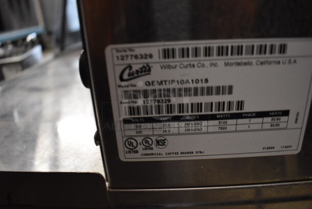 Curtis GEMTIF10A1015 Commercial Stainless Steel Twin Coffee Brewer With 2 Lower Warmers And Hot Water Faucet On Galvanized Legs. 220V, 1 Phase.  - Image 4 of 6