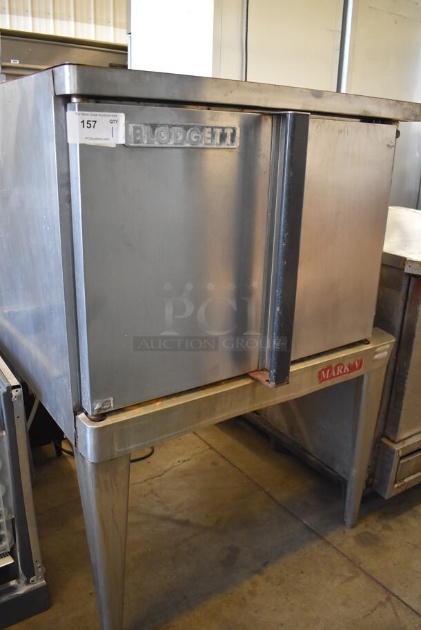 Blodgett Mark V Stainless Steel Commercial Electric Powered Full Size Convection Oven w/ Solid Doors and Thermostatic Controls on Metal Legs. 200-230 Volts, 3 Phase. 38x40x55