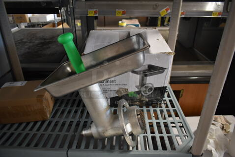 BRAND NEW SCRATCH AND DENT! Avantco 177MX20GRNDR Metal Commercial Meat Grinder w/ Tray and Pusher. 
