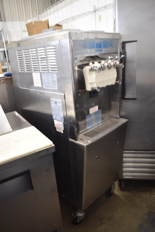 2010 Taylor 794-33 Commercial Stainless Steel Soft Serve Water Cooled Ice Cream Machine With 2 Hoppers On Commercial Casters. 208-230V, 3 Phase.  - Image 2 of 6