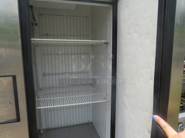 One Stainless True  2 Door Freezer With 5 Racks On Casters. Model# T-49F. 115 Volt. 54X30X82.5. $6697.60. - Image 3 of 3