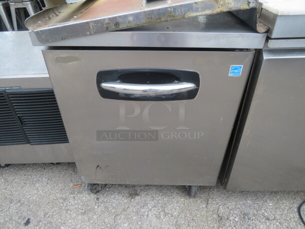 One Stainless Steel 1 Door Delfield Under Counter Refrigerator With 1 Rack, On Casters. Model#UR27. 115 Volt. 27.5X30X36 - Image 1 of 2