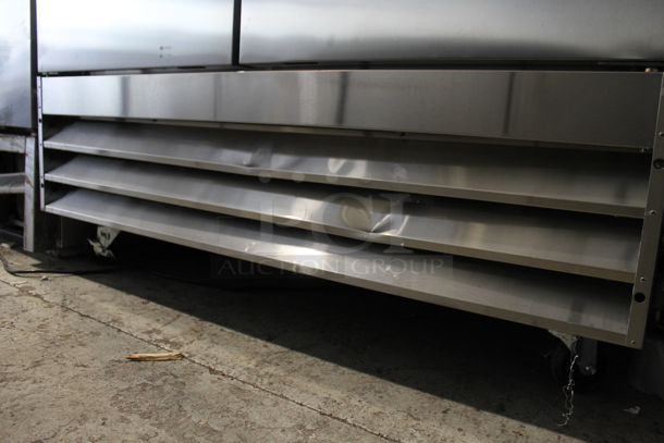 BRAND NEW SCRATCH AND DENT! 2022 Avantco 178A49RHC Stainless Steel Commercial 2 Door Reach In Cooler w/ Poly Coated Racks on Commercial Casters. 115 Volts, 1 Phase. Tested and Working! - Image 4 of 8