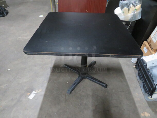 One Black Laminate Table Top On A Pedestal Base. 36X36X29 - Image 1 of 1