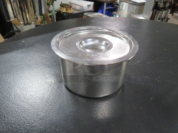 One Stainless Steel Crock With Lid.