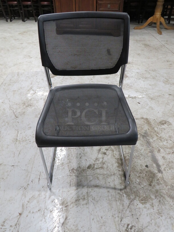 Chrome Stack Chair With Black Mesh Seat And Back. 3XBID