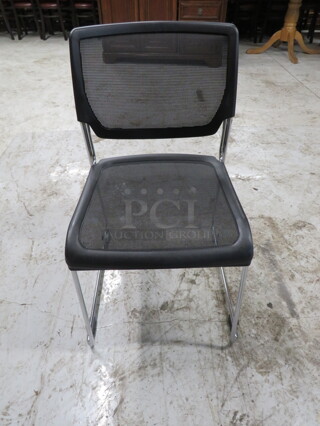 Chrome Stack Chair With Black Mesh Seat And Back. 3XBID