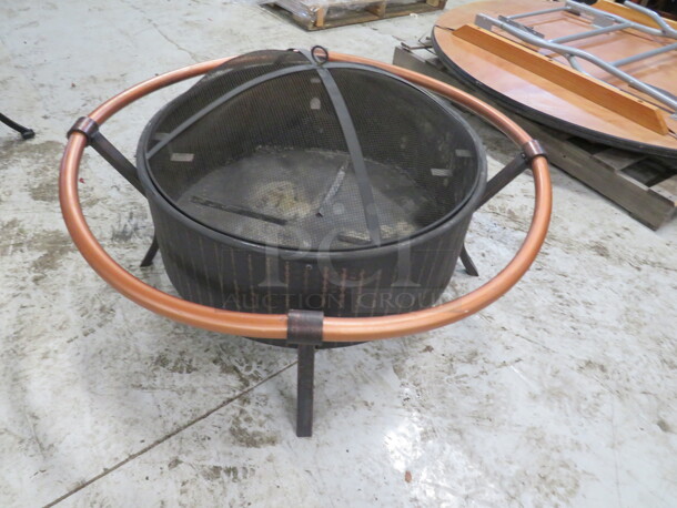 One 38X20 Decorative Metal Firepit With Top Cover.