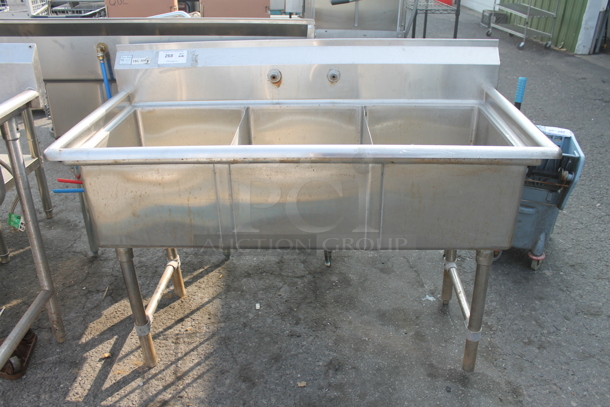 Sani Safe Commercial Stainless Steel 3 Bay Sink on Galvanized Legs.