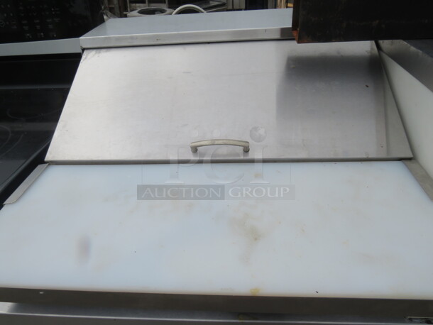 One Stainless Steel BERG 1 Door Refrigerated Prep Table With 1 Rack And Cutting Board On Casters. 27X30X44 - Image 2 of 2