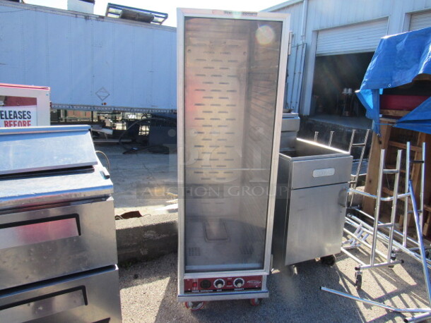 One Winholt Heater Proofer On Casters. 20.5X32.5X67