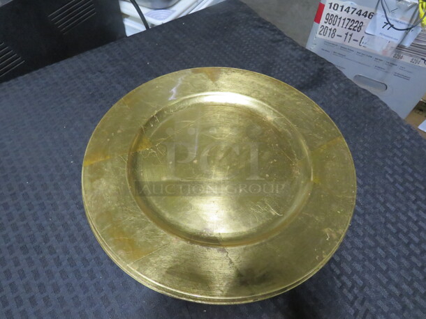 13 Inch Gold Charger Plates. 4XBID - Image 1 of 1