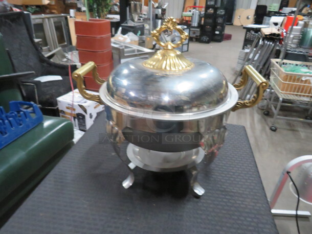 One Round Chafer With Lid, And Gold Accents.