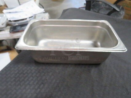 One 1/3 Size 4 Inch Deep Hotel Pan.