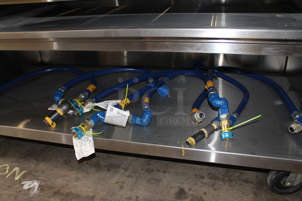 BRAND NEW! Jade Range JTRH-60B Stainless Steel Commercial Natural Gas Powered Charbroiler Grill w/ Under Shelf and 5 Gas Hoses on Commercial Casters.  - Image 5 of 8