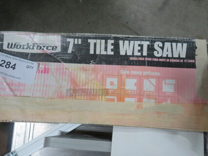 One Work Force 7 Inch Wet Tile Saw.