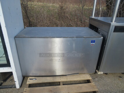 One Manitowic Water Cooled Ice Maker. Model# SY1405W. 208-230 Volt. 48X25X26.5