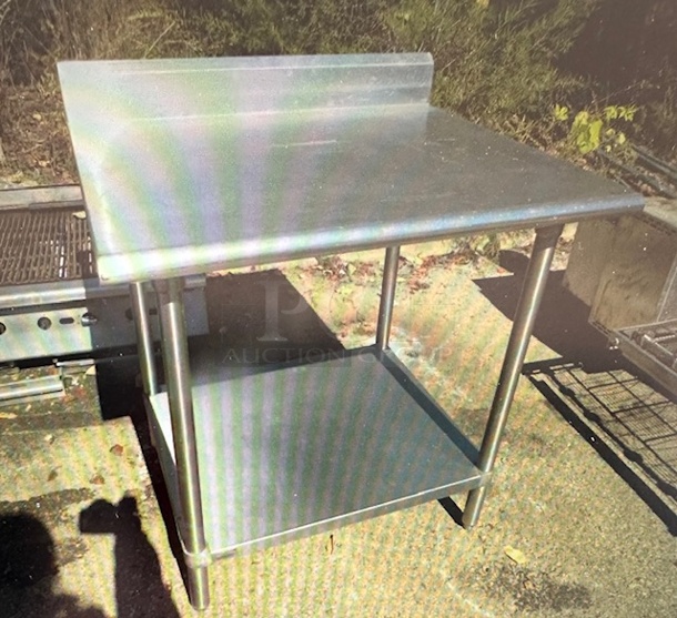 One Stainless Steel Table With Back Splash And SS Under Shelf. 36X30X40.5 - Image 1 of 1