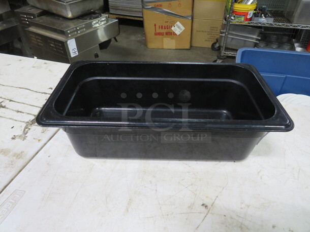 One 1/3 Size 4 Inch Deep Black Food Storage Container.