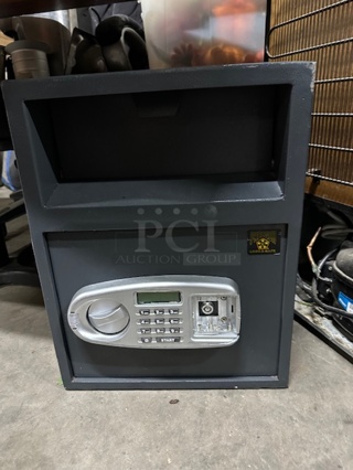 One Paragon Floor Safe With Keys. 13.5X12X17