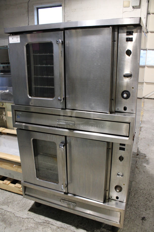 2 Garland Stainless Steel Commercial Natural Gas Powered Full Size Convection Oven w/ View Through Door, Solid Door, Metal Oven Racks and Thermostatic Controls. 40,000 BTU. 40x39x71. 2 Times Your Bid!