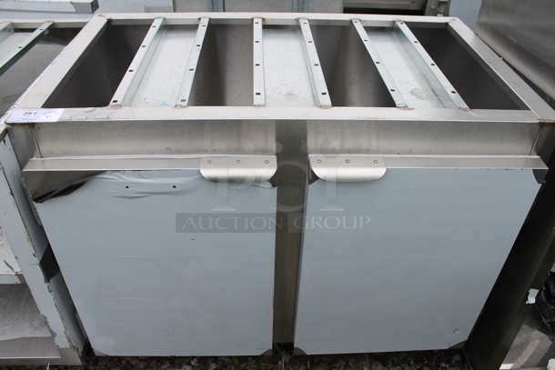 BRAND NEW SCRATCH AND DENT! Stainless Steel Commercial Table Frame w/ 2 Doors and Under Shelf. - Image 1 of 5