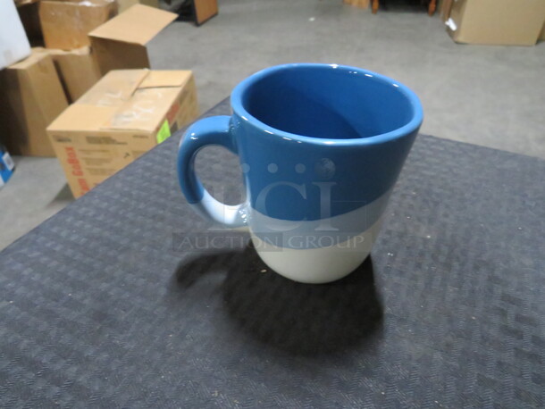 AT HOME Blue Coffee Cup. 11XBID - Image 1 of 1