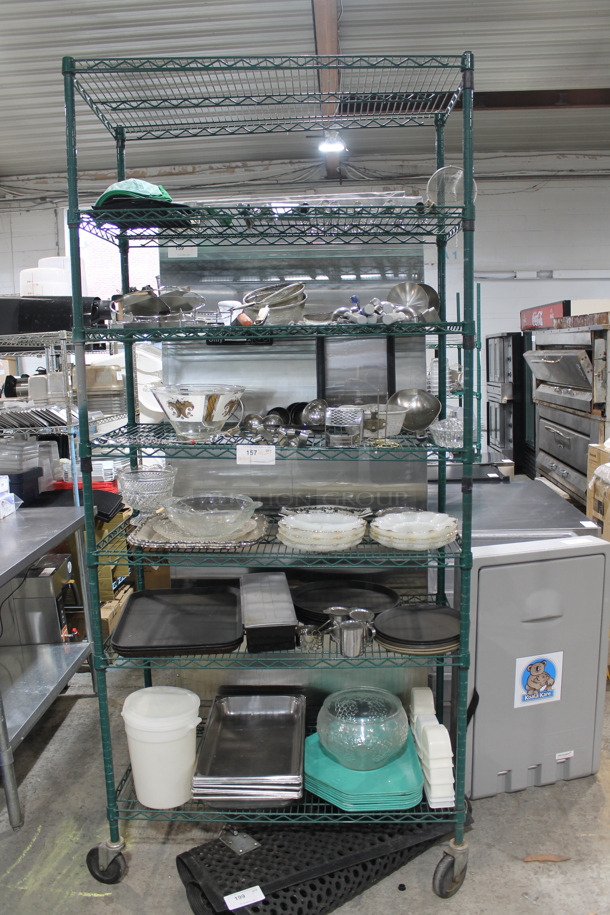ALL ONE MONEY! Lot of Various Items Including Stainless Steel Drop In Bins, Serving Trays and Utensils. Does Not Include Shelving Unit. 
