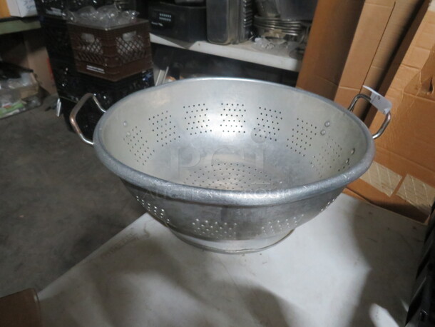 One 16.5 Inch Aluminum Collander.