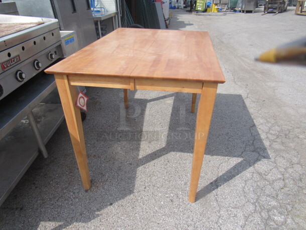 One NEW Wooden Table With Leaf. 54X36X36. With Leaf 54X54X36. Assembly Required. - Image 2 of 6