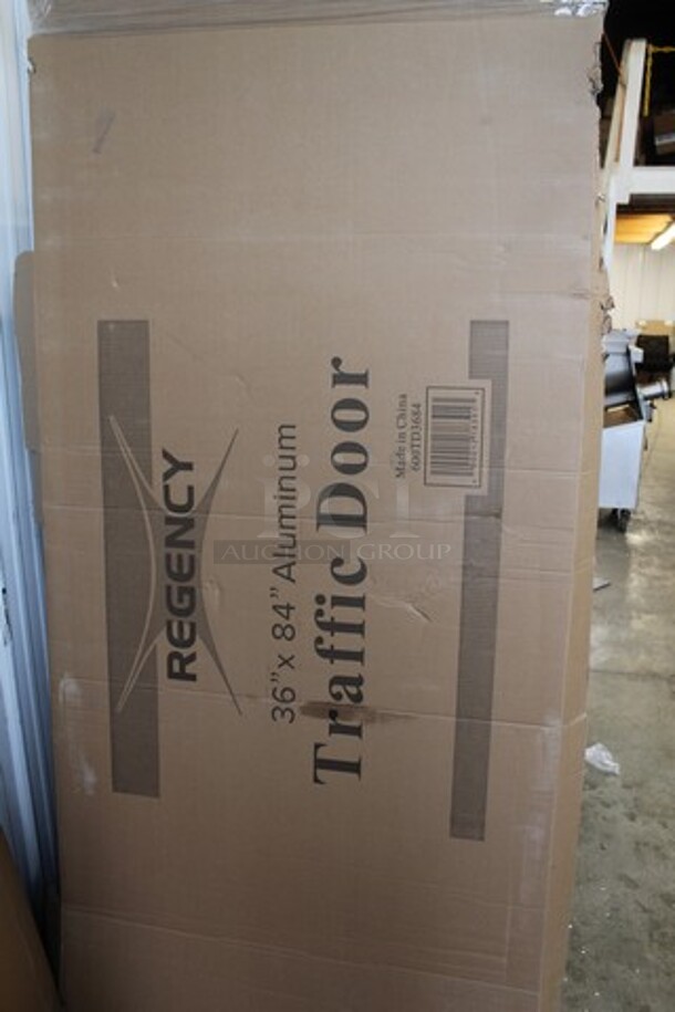 BRAND NEW SCRATCH AND DENT! Regency 600TD3684 Single Aluminum Swinging Traffic Door with 9" x 14" Window - 36" x 84" Door Opening - Image 2 of 3