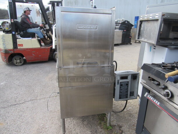 One Hobart Dishwasher. Model# AM-14.100-120/230 Volt. 1 Phase. 36X36X60