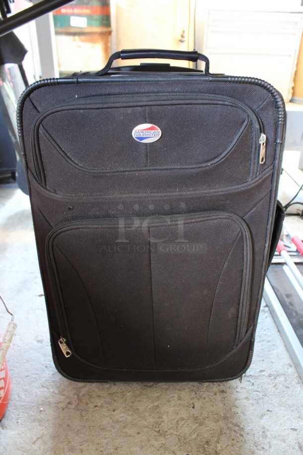 American Tourister Black Luggage. 13x7x21