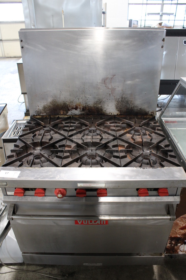 Vulcan Stainless Steel Commercial Natural Gas Powered 6 Burner Range w/ Oven and Back Splash. 36x31x59