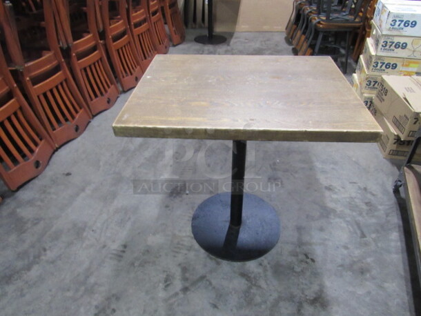 One Solid Wood Table Top On A Metal Pedestal Base. 30X24X30. 1-3/4 Thick Table Top.