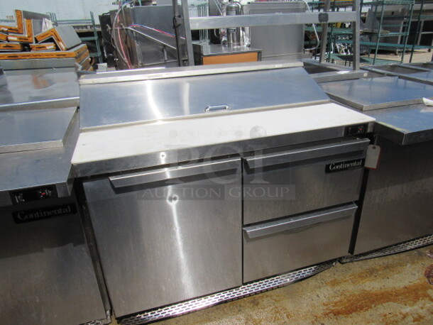 One SS Continental 1 Door 2 Drawer Refrigerated Prep Table With Cutting Board. 115 Volt. Model# SW48-12. 48X30X41
 - Image 1 of 2