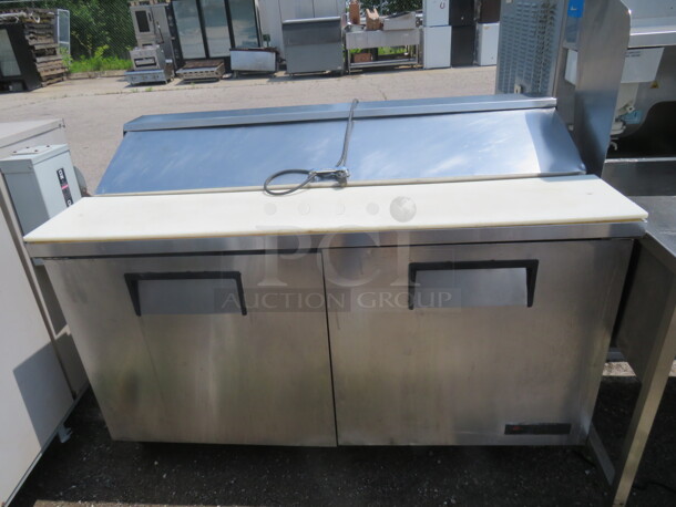 One WORKING SS True 2 Door Refrigerated prep Table With Cutting Board, On Casters. Model# TSSU-60-16. 115 Volt. 60X30X43 - Image 1 of 2