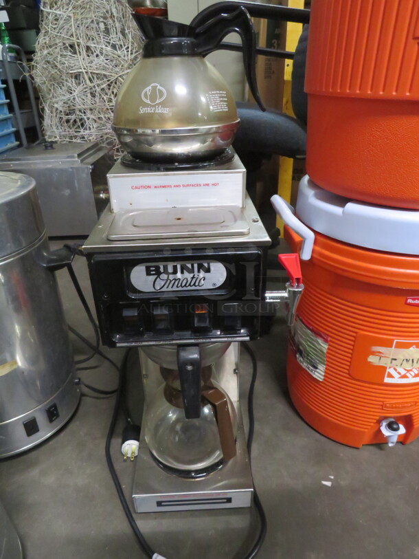 One Bunn  O Matic Coffee Brewer With Filter Basket, Dual Top Warmers, And 2 Coffee Pots. Model# HSTP-20. 120 Volt. 8X8X21