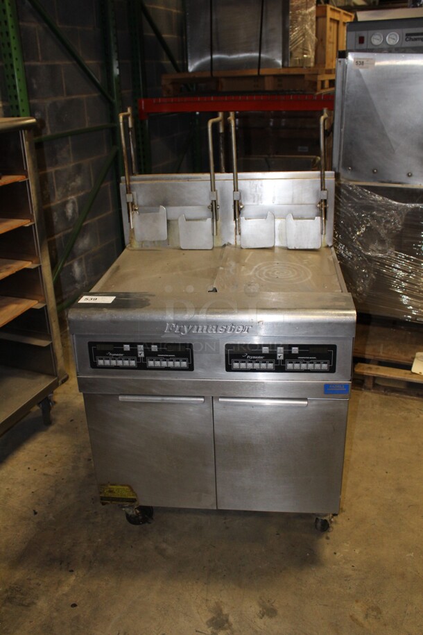 FABULOUS! Frymaster Model FPPH255BLCSC Commercial Stainless Steel Natural Gas Double Floor Fryer With Filtration System,Well Covers And Basket Racks On Casters. 31x36x56. Working When Pulled!